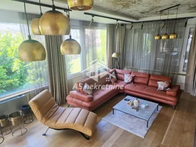 Dedinje-petosoban stan sa privatnim dvorištem